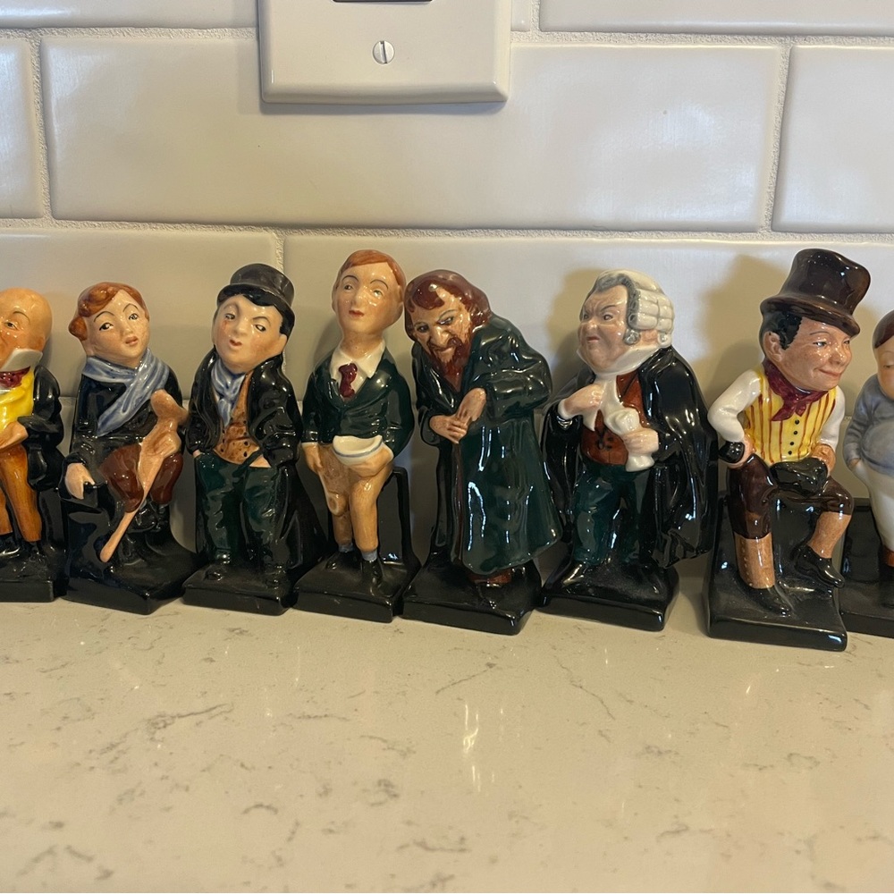 Set of 8 Royal Doulton Dickens’ cast figures.